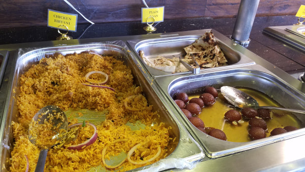 chicken biryani, naan bread, and gulab jamun at urban tandoor